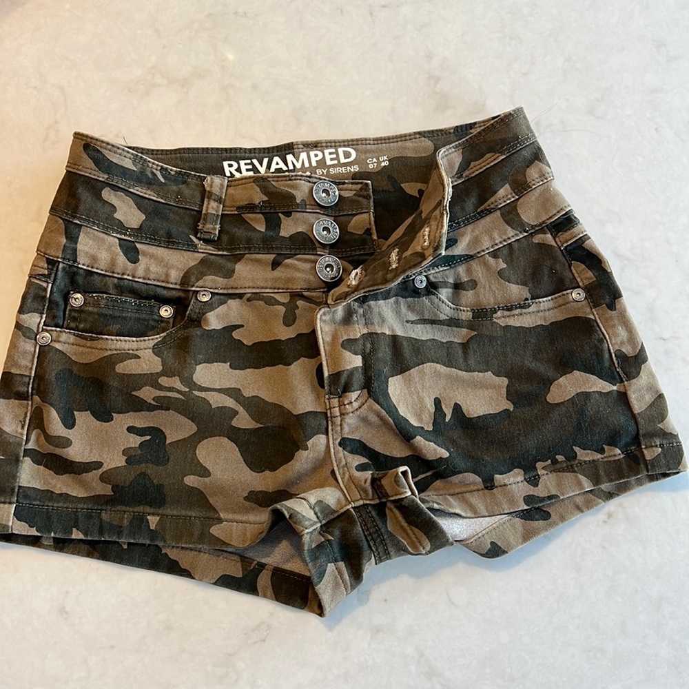 Camo high rise jean shorts.